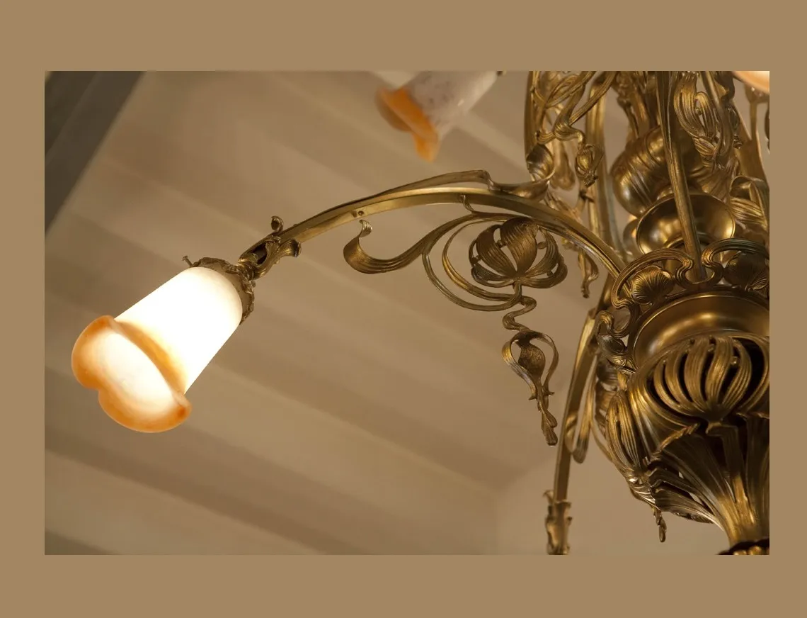 Antique hanging lamp by Charles Schneider featuring elegant details.
