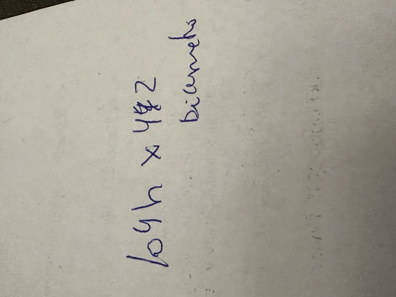 Antique hanging lamp casting light in a classic setting.