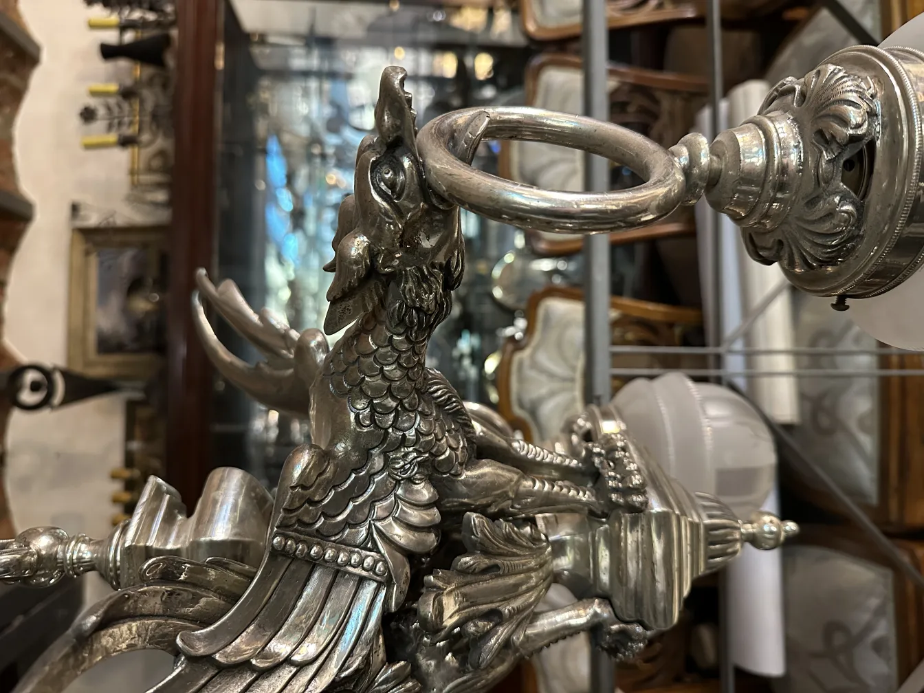 Decorative antique hanging lamp with intricate designs.