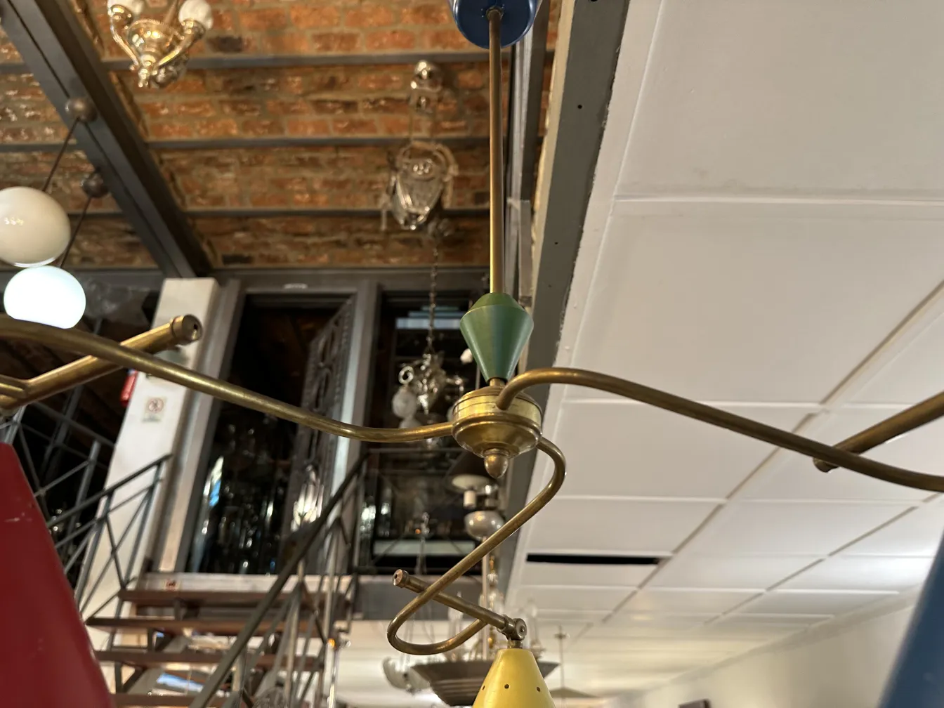 Antique hanging lamp with colorful details in the ambiance.