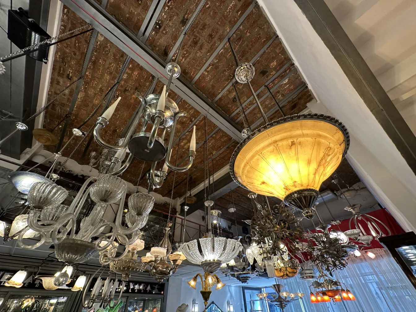 Antique glass hanging lamp in a display setting