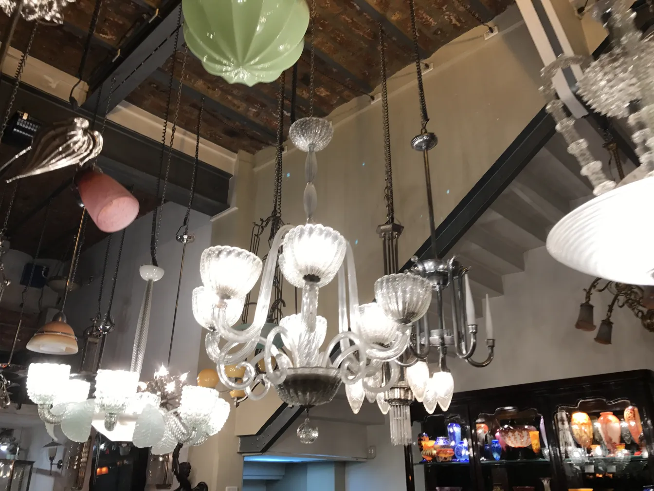 Antique hanging lamp with multiple arms in the store