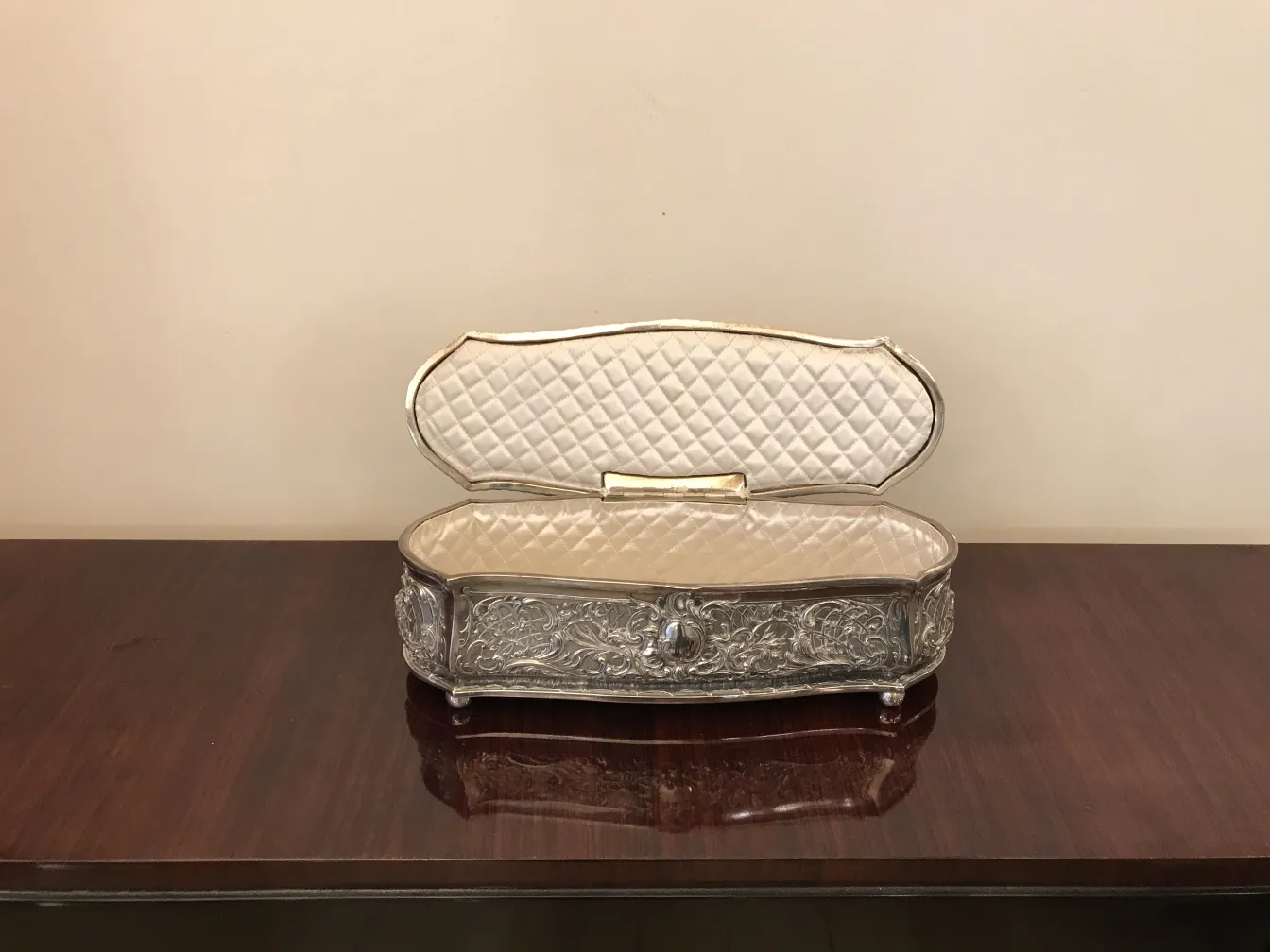 Antique box with elegant decoration, light color