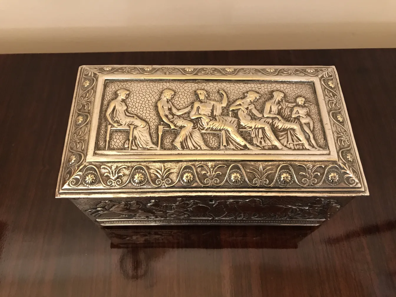 Antique box decorated with unique reliefs.