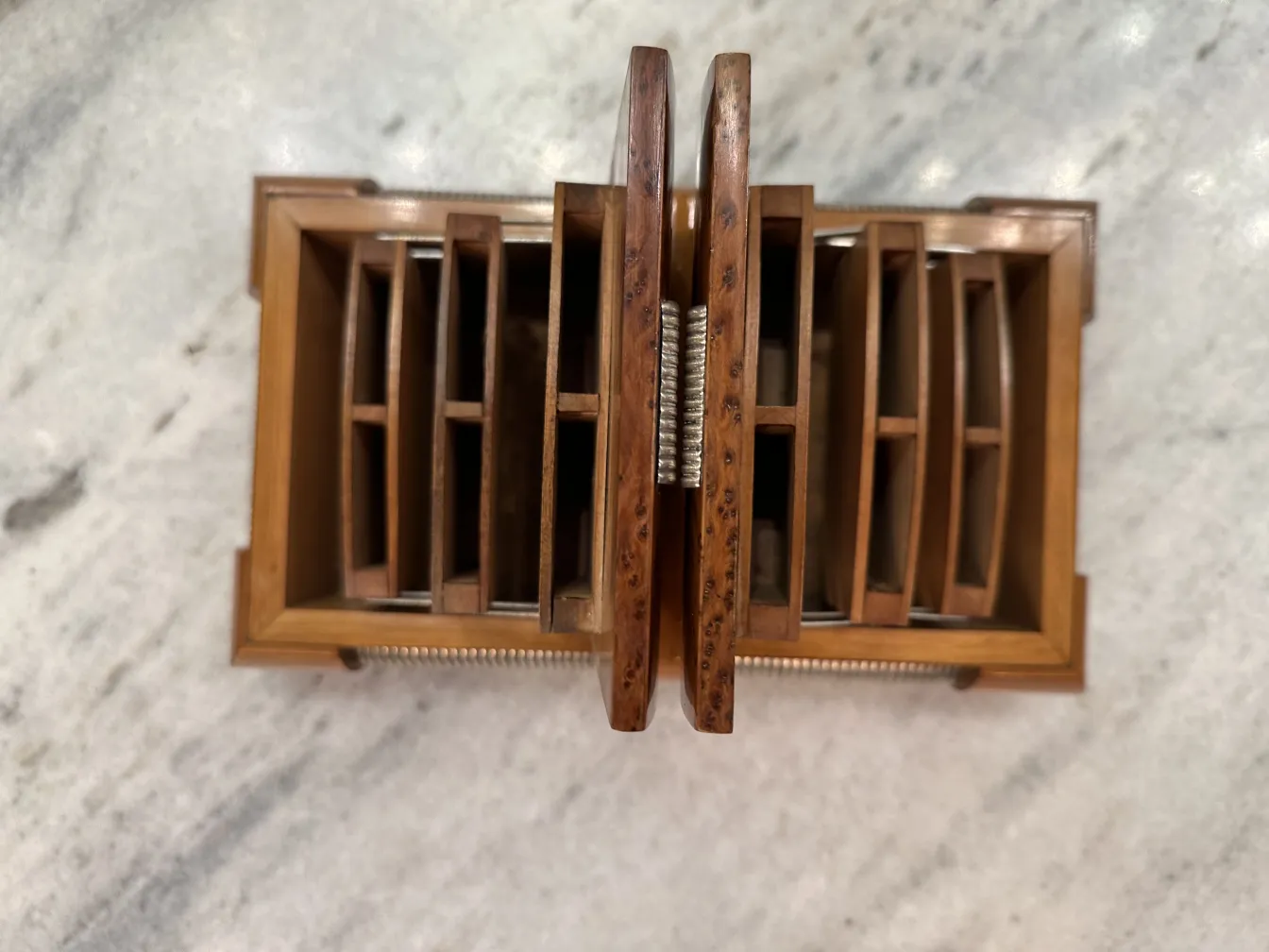 Antique wooden box containing several compartments inside