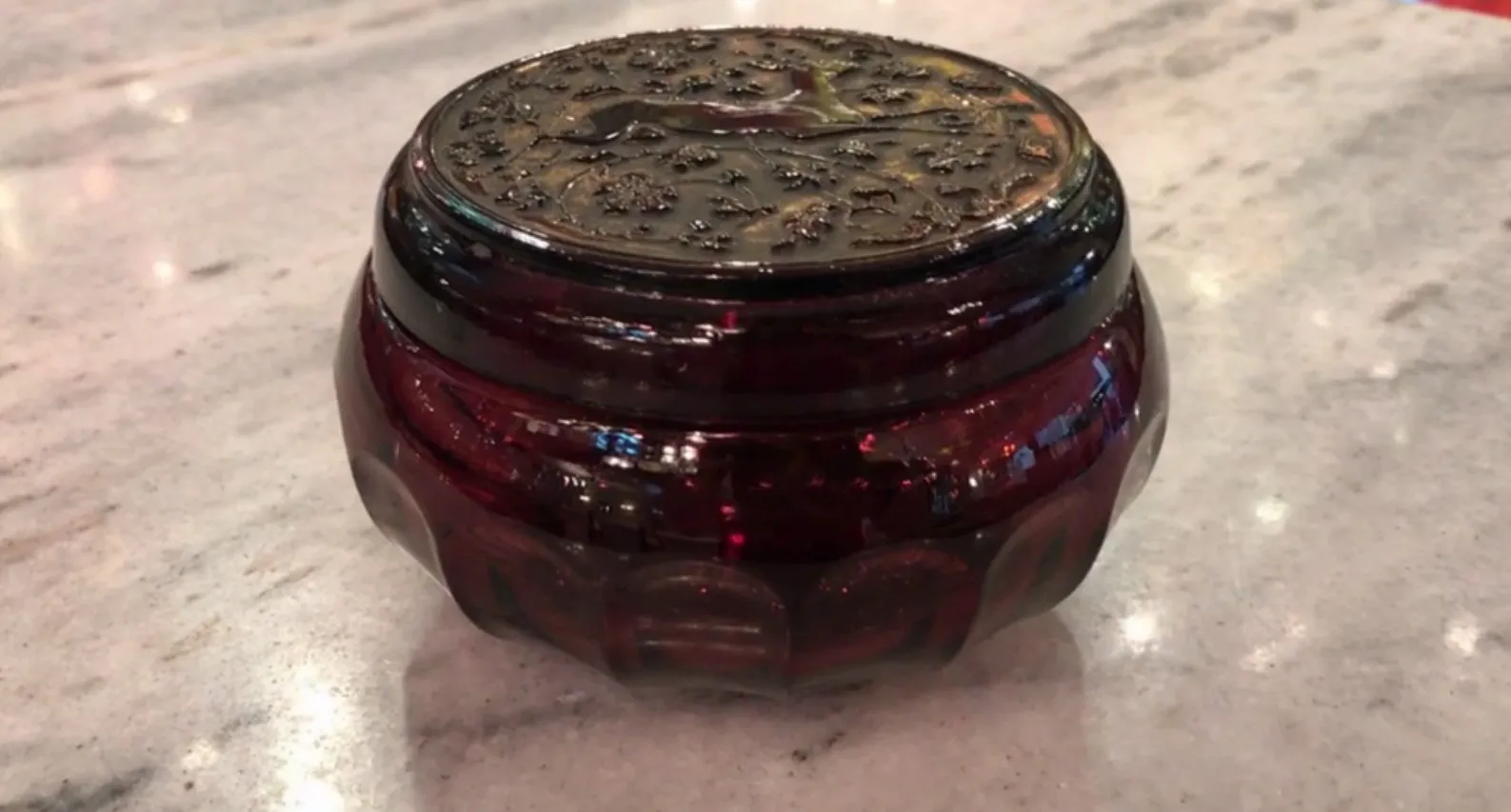 Antique red glass box with decorative lid