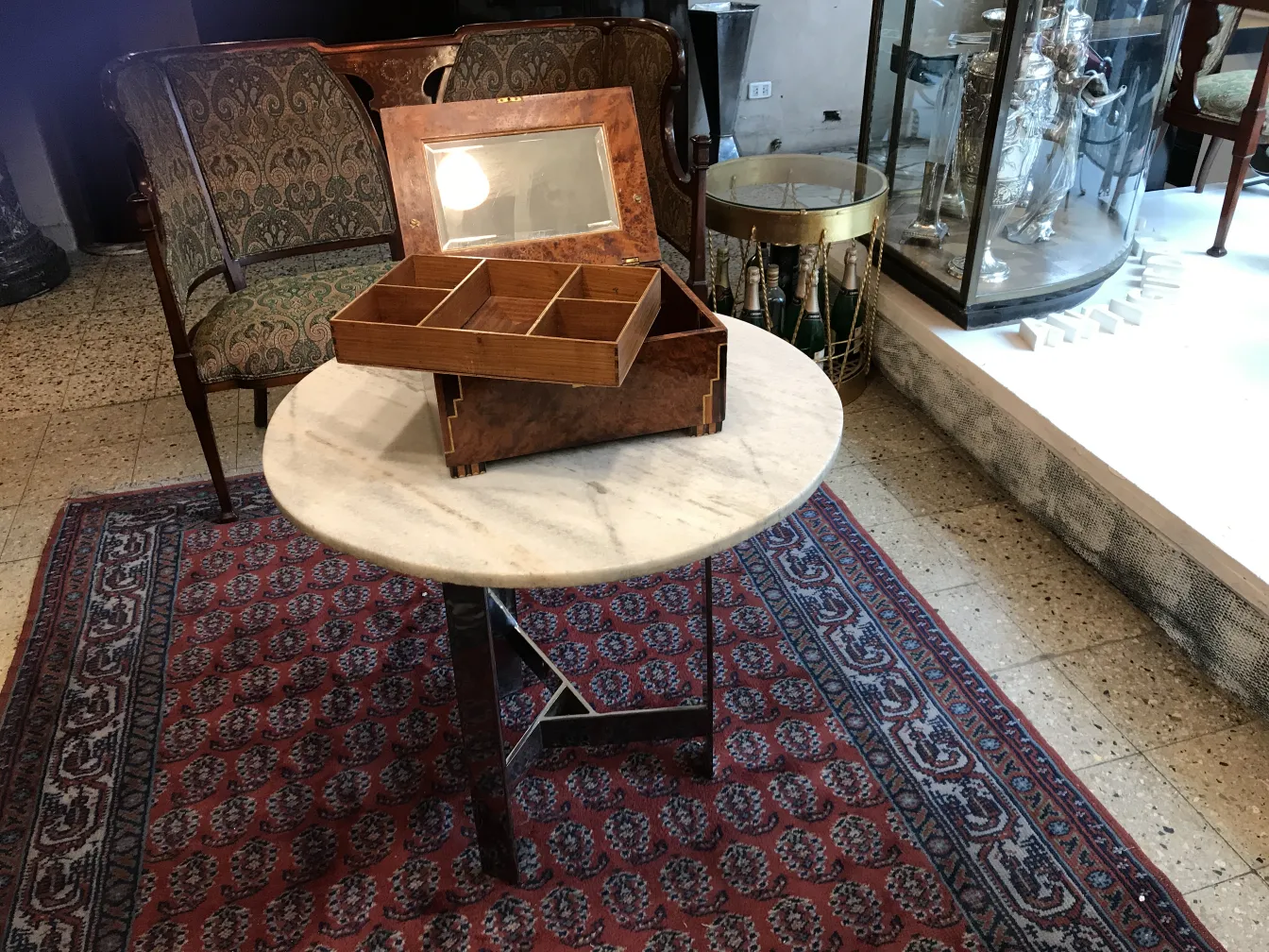 Antique wooden box with compartments on a table