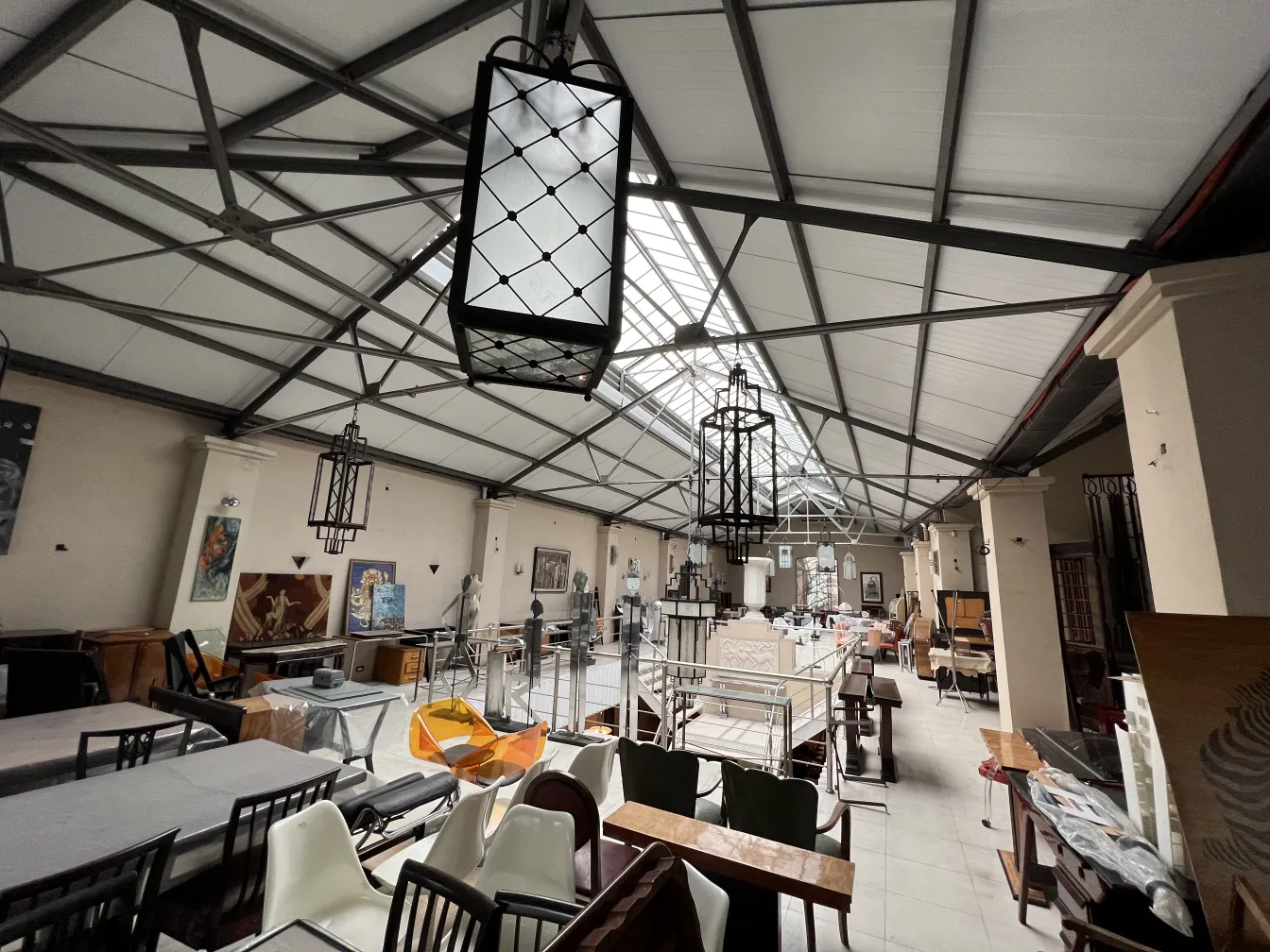 Antique hanging lanterns in a spacious and bright setting