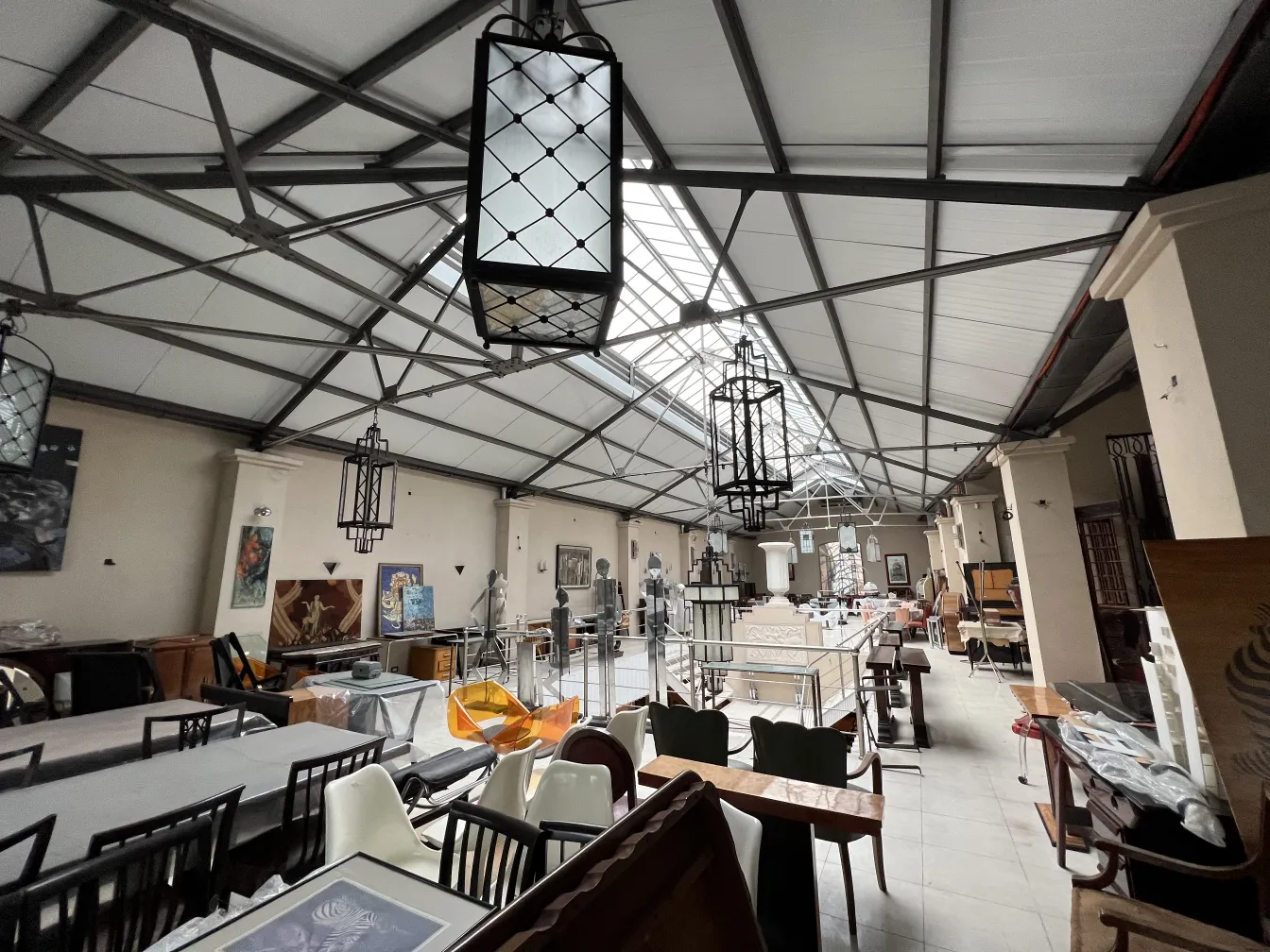 Antique ceiling lanterns in a spacious and bright environment.