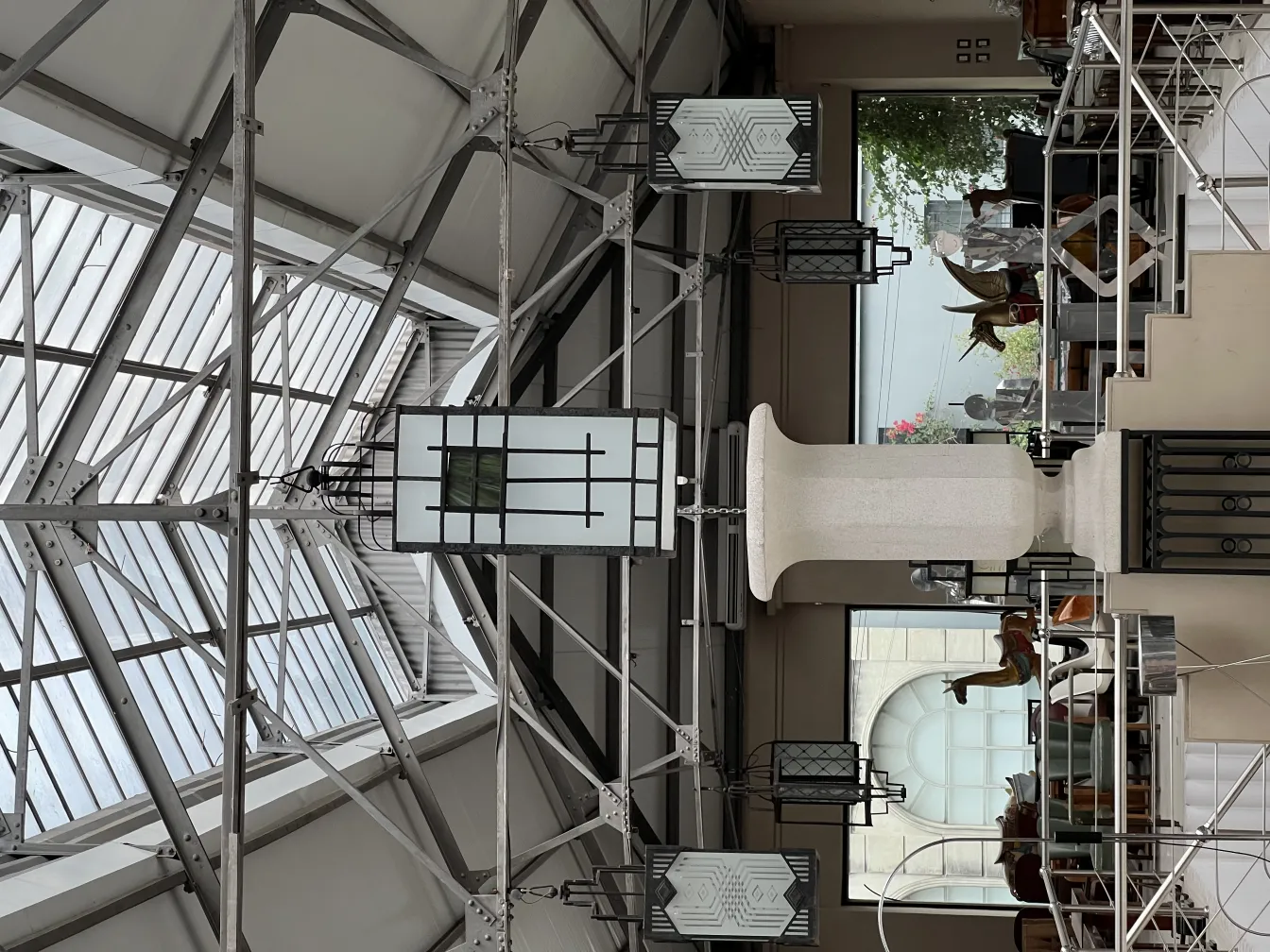 Antique ceiling lanterns with minimalist design in a cozy and modern setting.