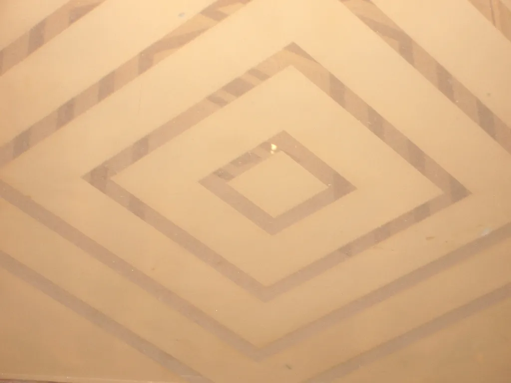 Antique ceiling lanterns with decorative patterns, warm ambiance.