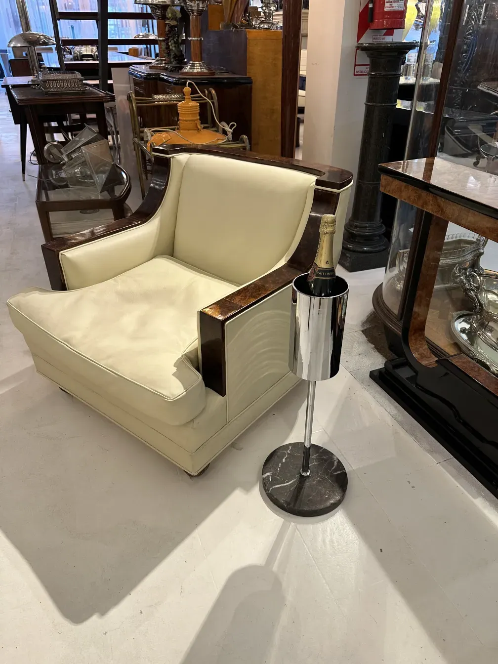 antique champagne cooler with shiny metal finish