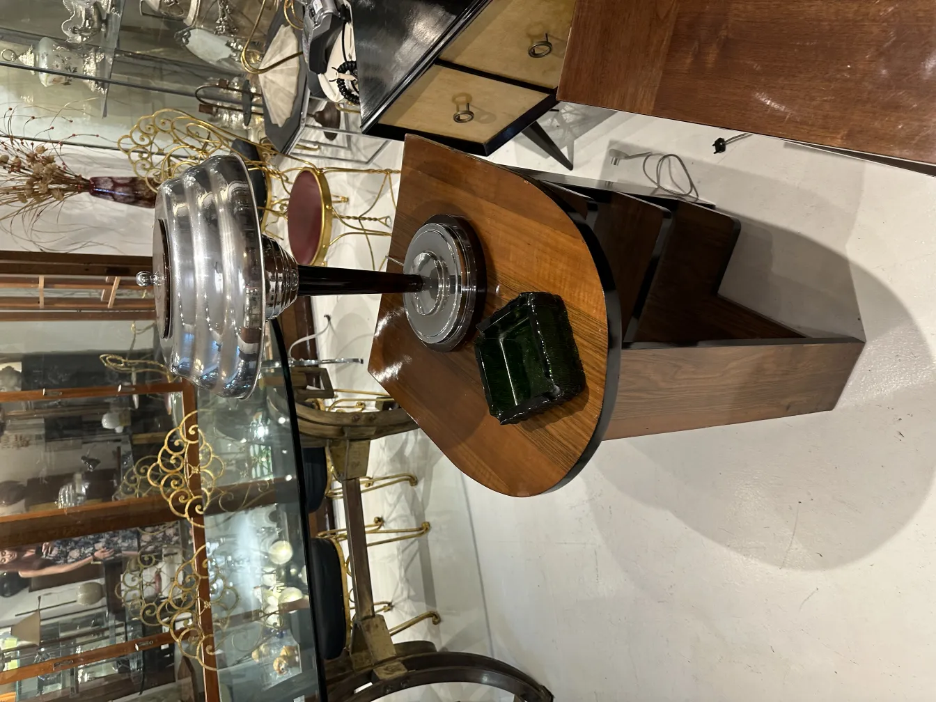 Antique standing ashtray in an elegant and decorative setting