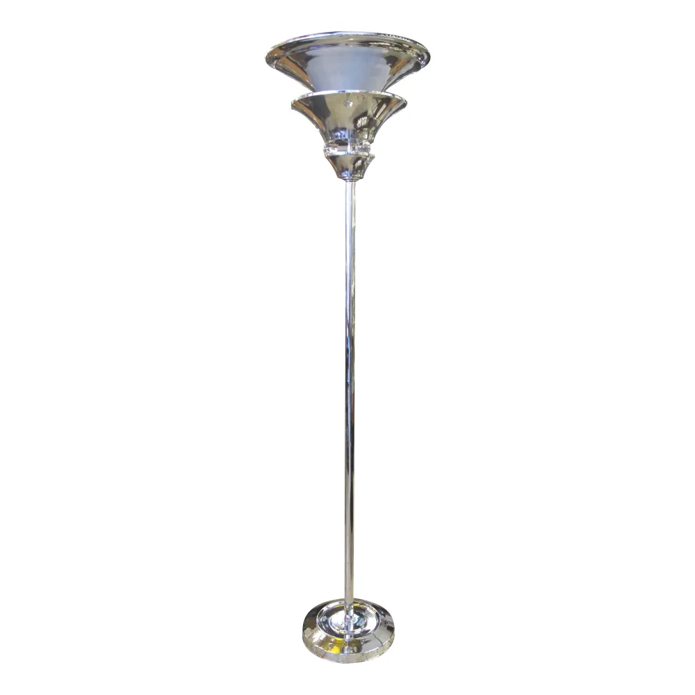 Antique floor lamp with round base and elegant shade.