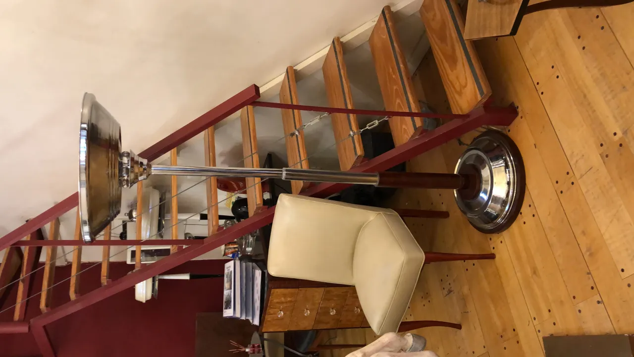 antique floor lamp with an elegant design in a home setting