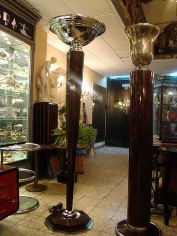 Antique floor lamp with stylized base in an elegant setting