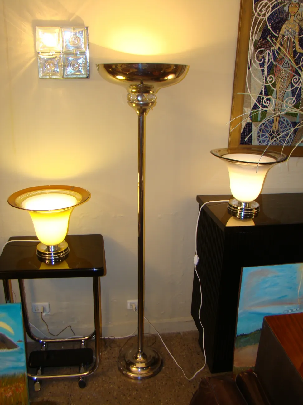 Antique floor lamp, elegant and shiny, creating a cozy ambiance.