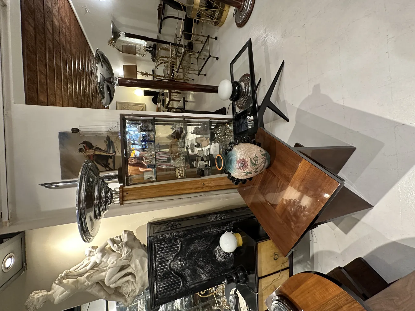 antique floor lamp with elegant base and soft light in a cozy setting