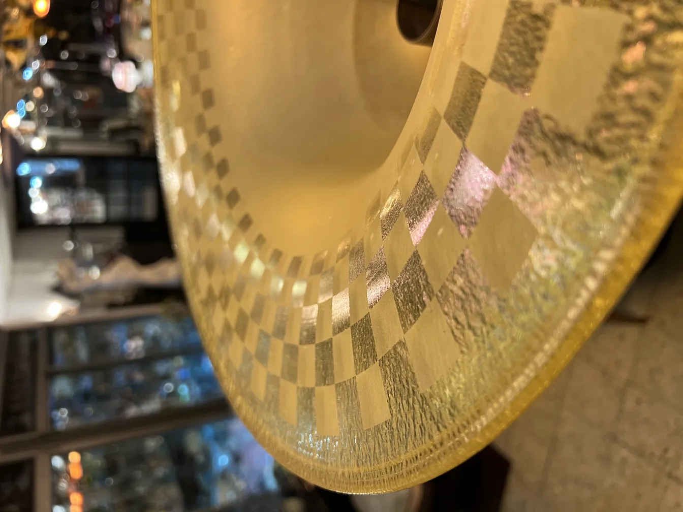 antique floor lamp with decorative shade details, in a cozy setting