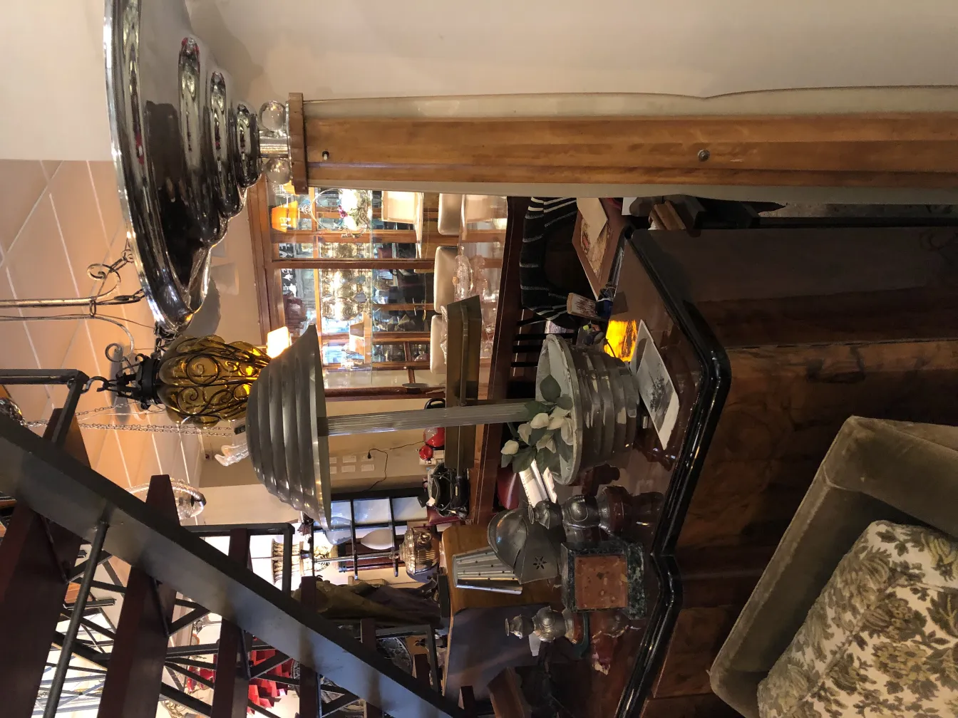 Antique floor lamp with multiple levels and elegant design