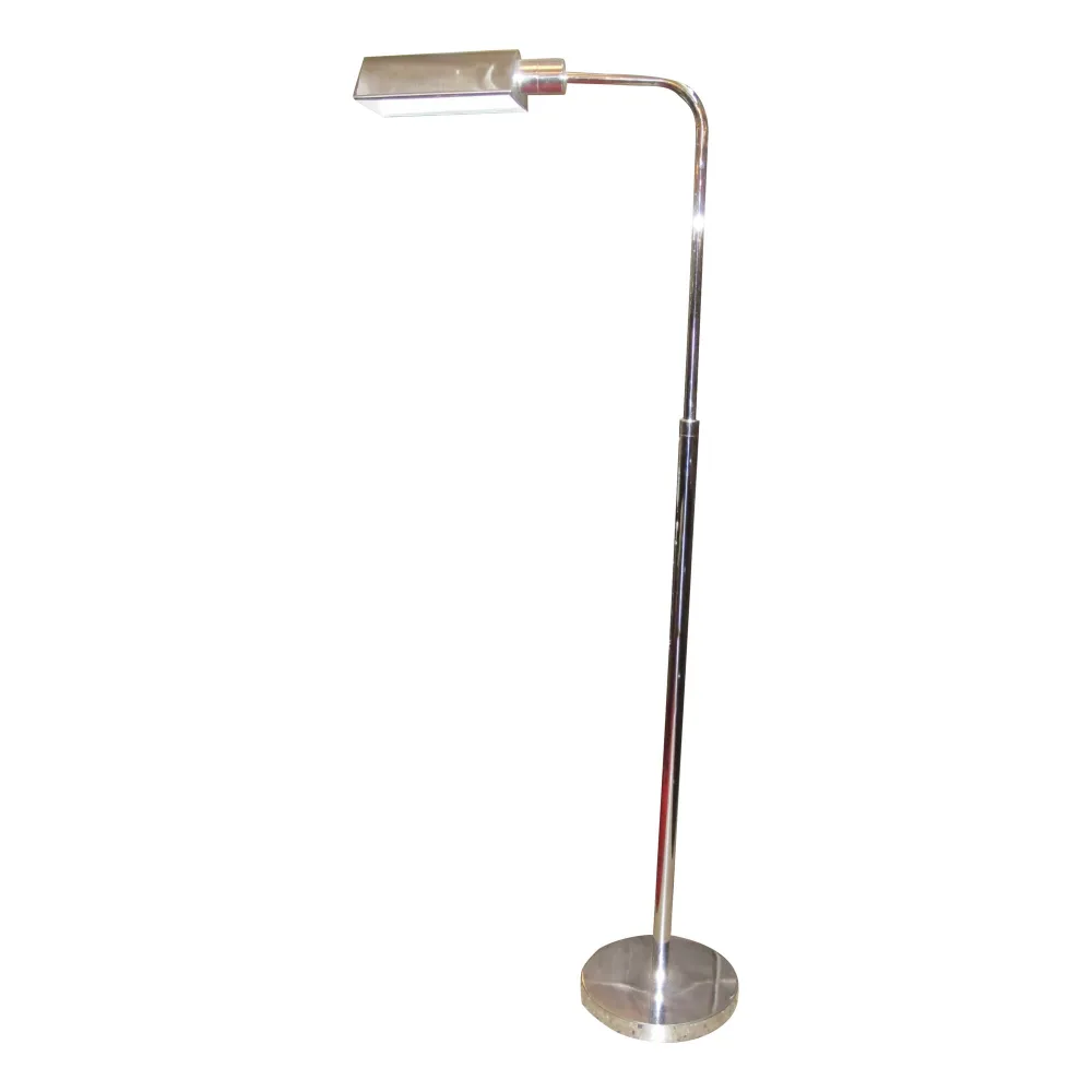 antique floor lamp with a tubular shape and circular base, decorative
