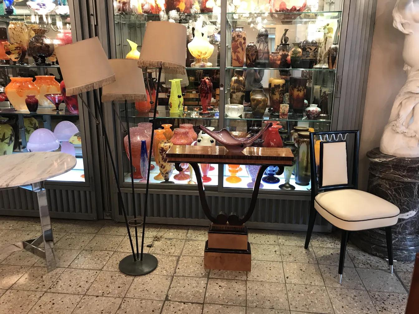 antique floor lamp by Jean Royère in elegant setting