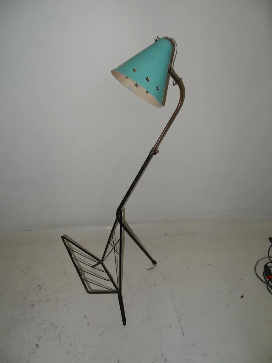 Antique floor lamp with colorful shade in neutral setting