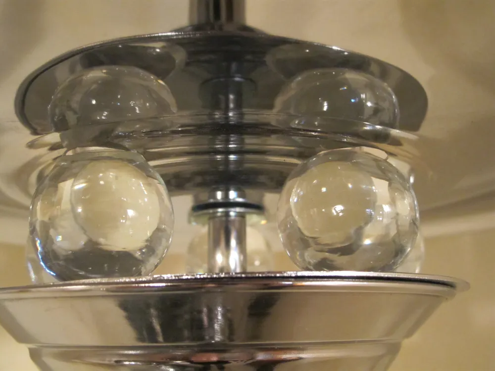 Top view of two antique floor lamps with spheres