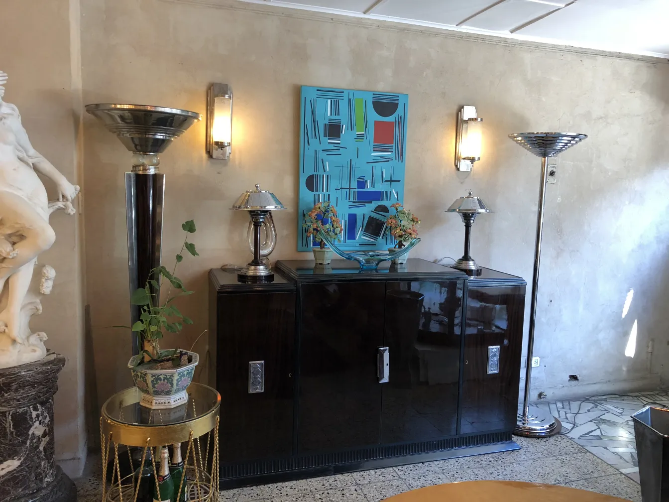 Two antique floor lamps with elegant designs in a cozy atmosphere