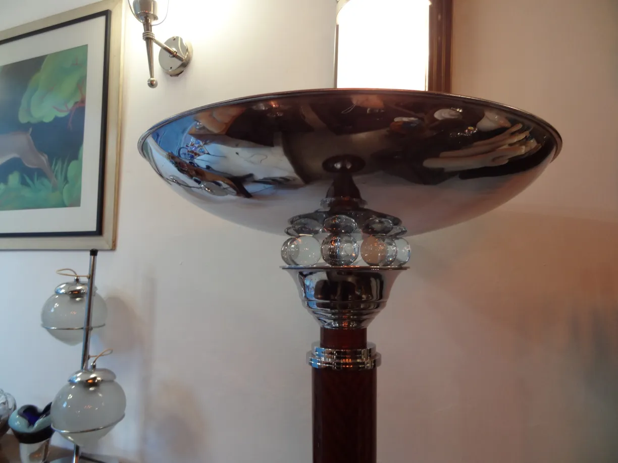 two antique floor lamps with shiny finish