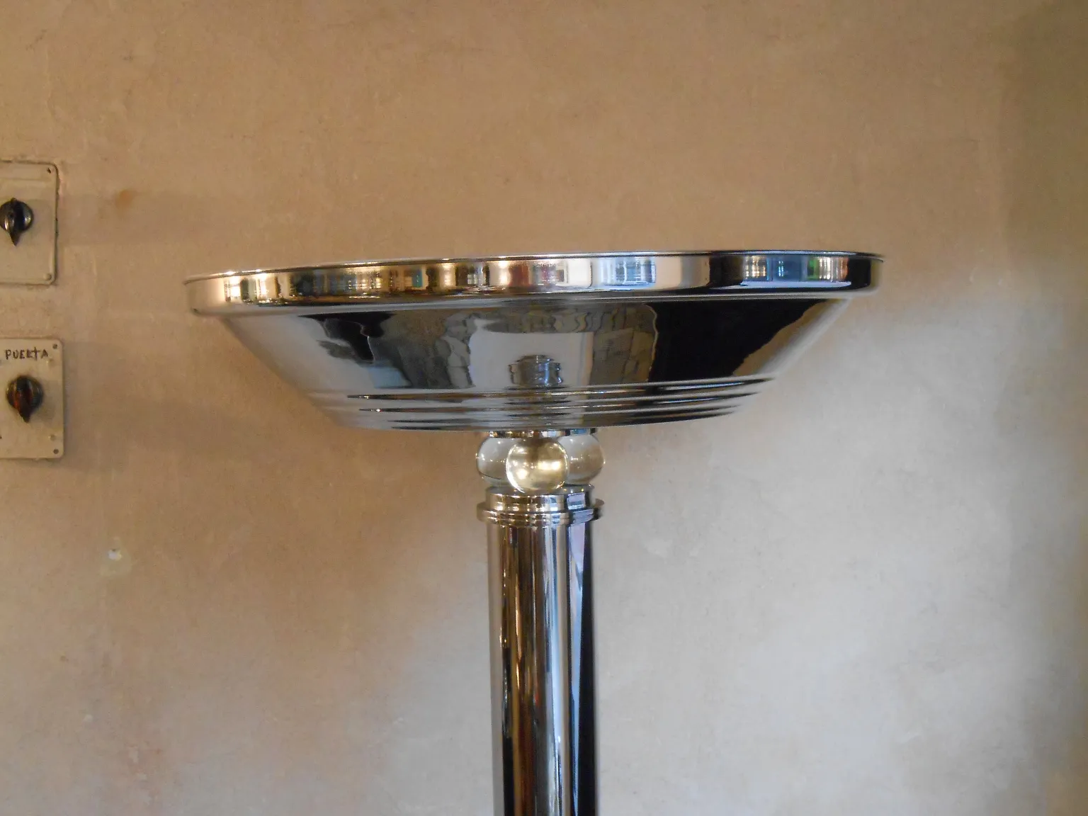 2 elegant antique floor lamps, creating a warm ambiance