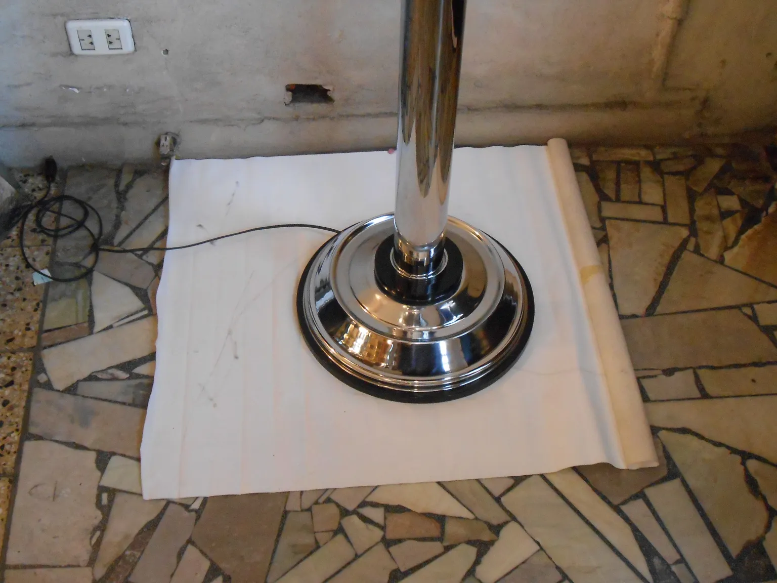 view of 2 antique floor lamps with chrome base in neutral setting