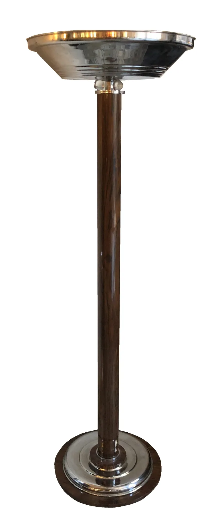 two antique floor lamps in a cozy setting, with details on the base