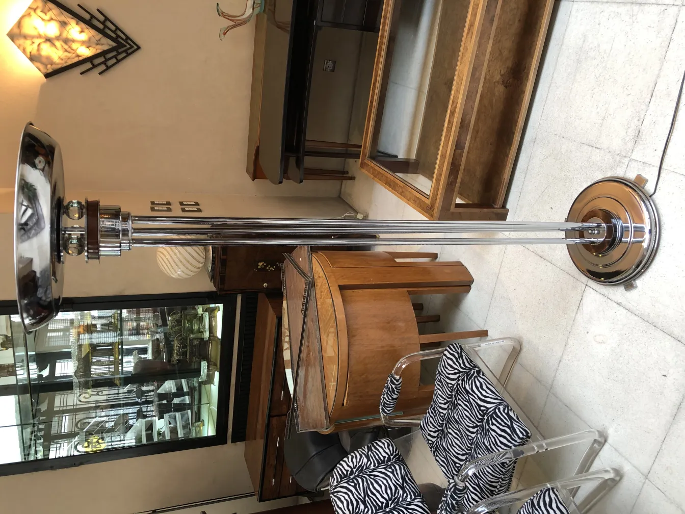 two antique floor lamps in an elegant setting