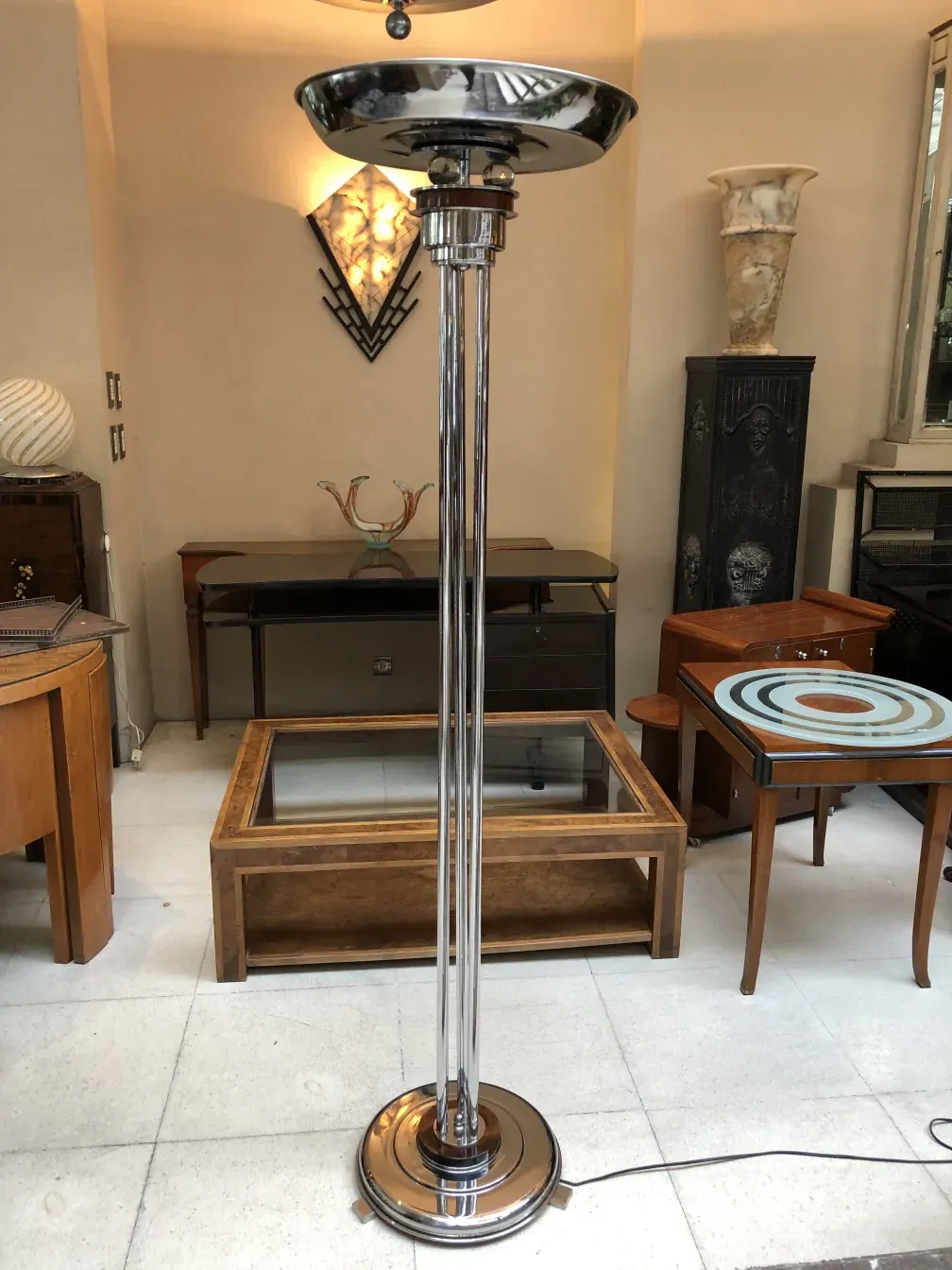 Two antique floor lamps set in a cozy environment
