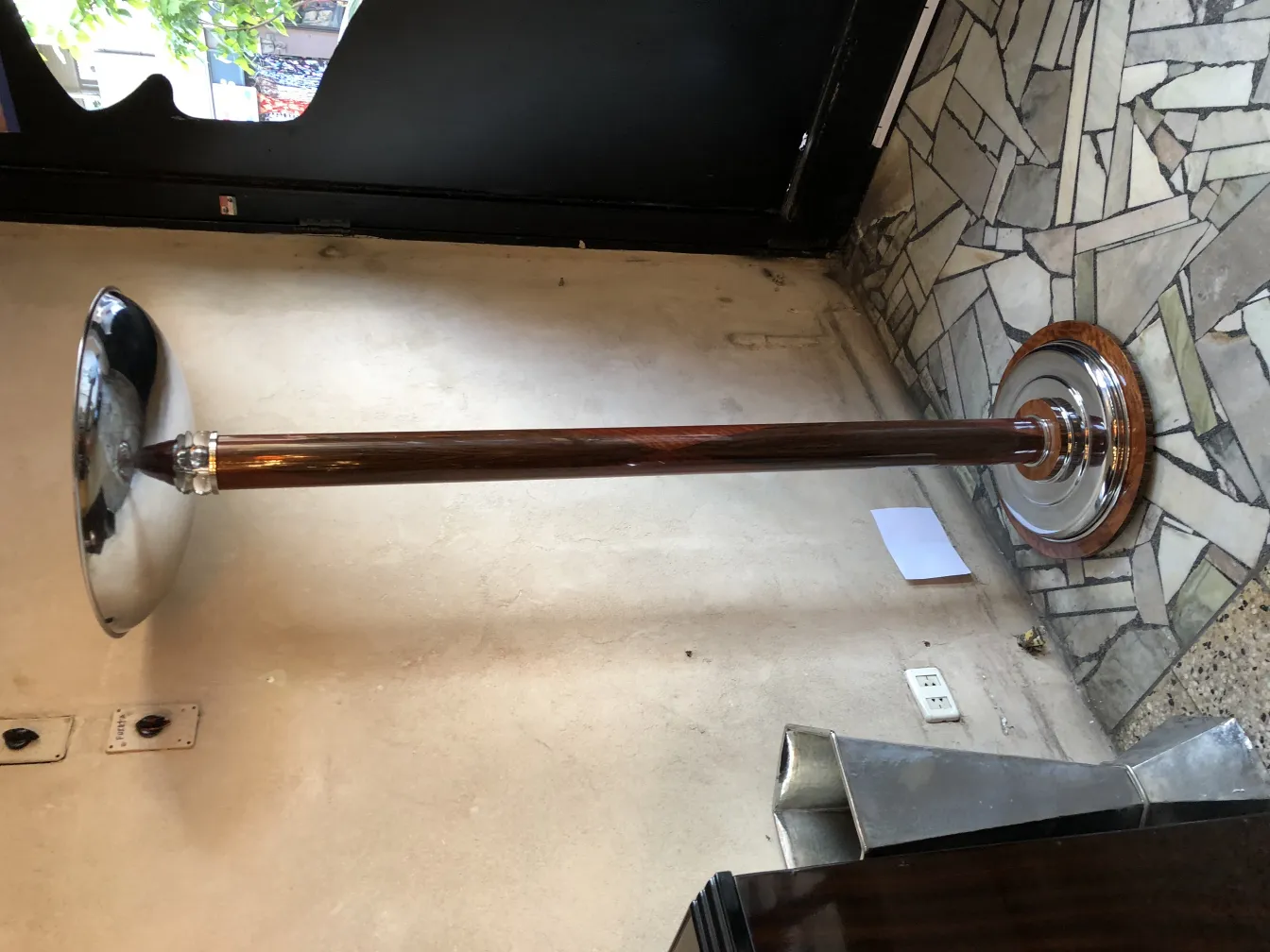 2 floor lamps in an antique setting with decor