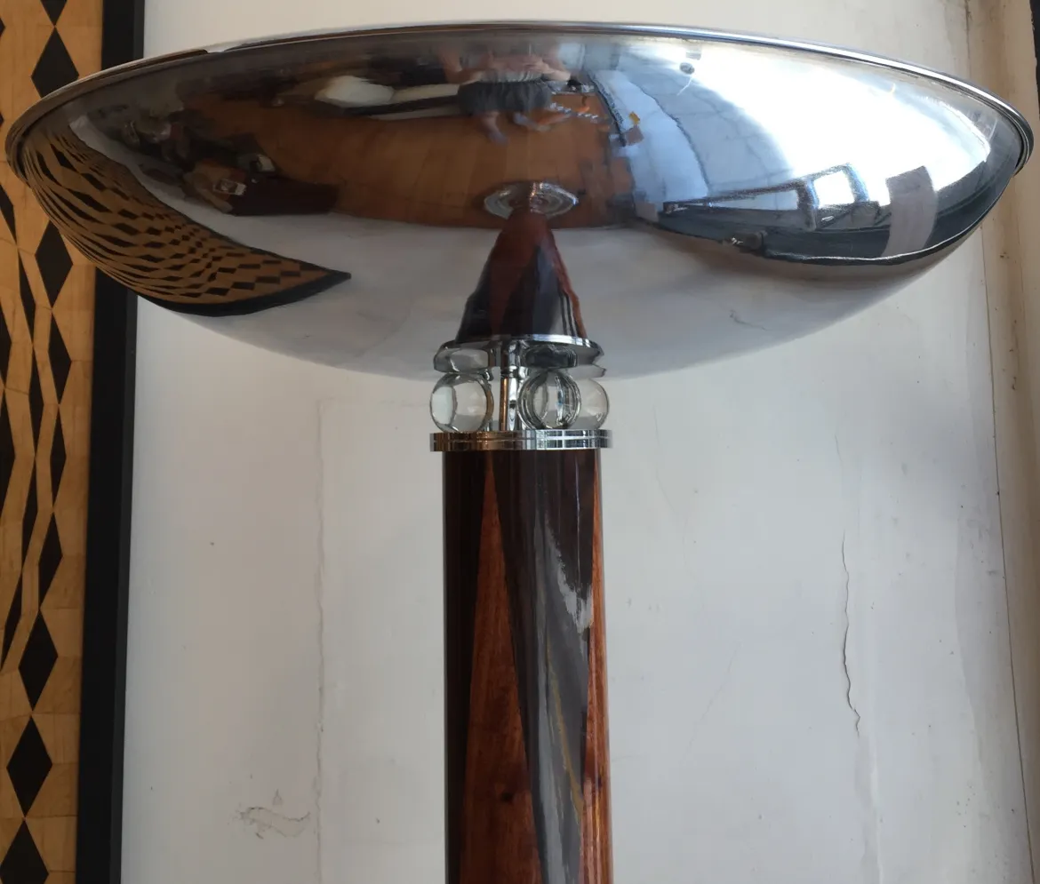 close-up of 2 antique floor lamps with elegant base and shiny shade