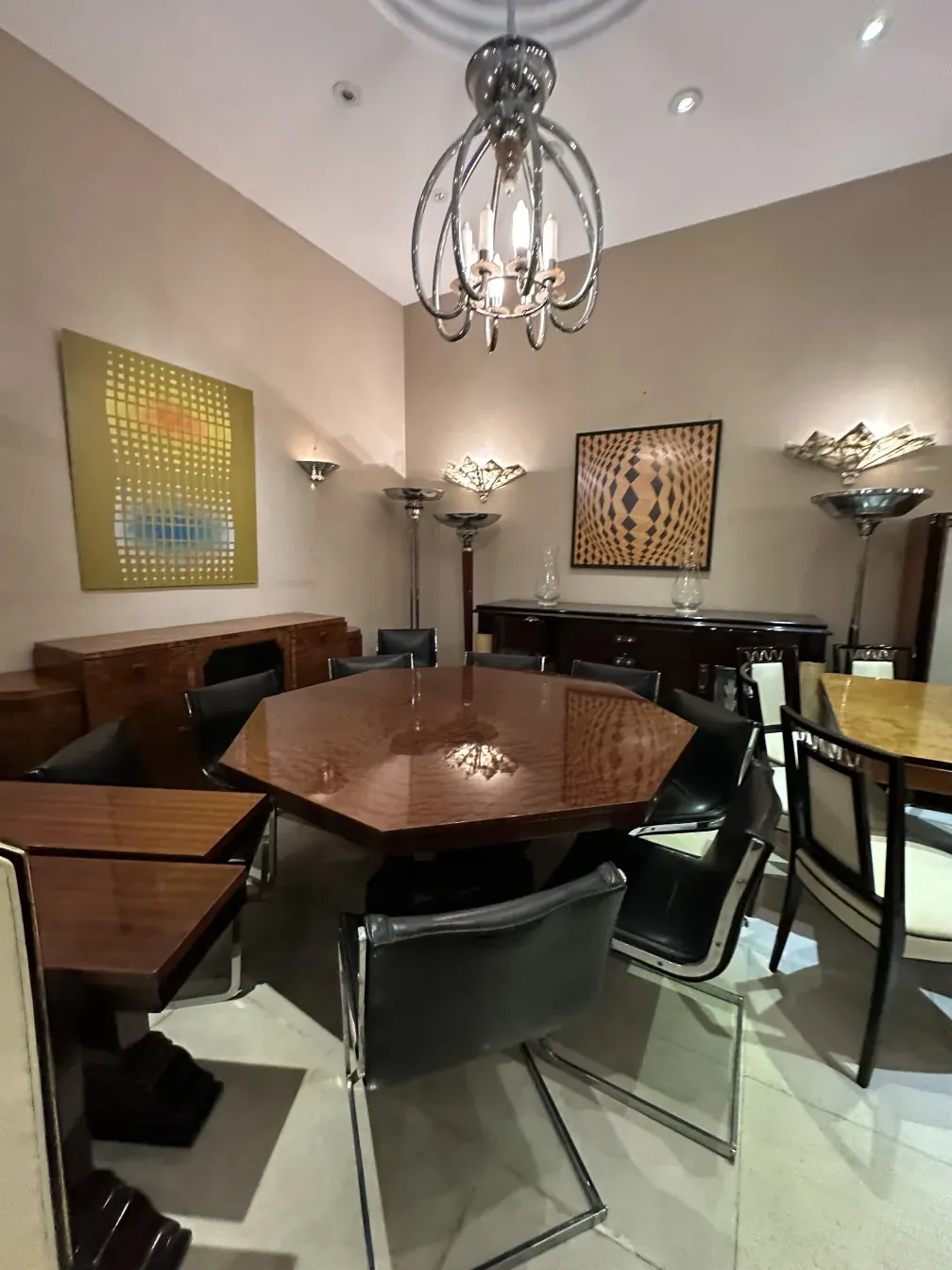 two antique floor lamps in a modern setting