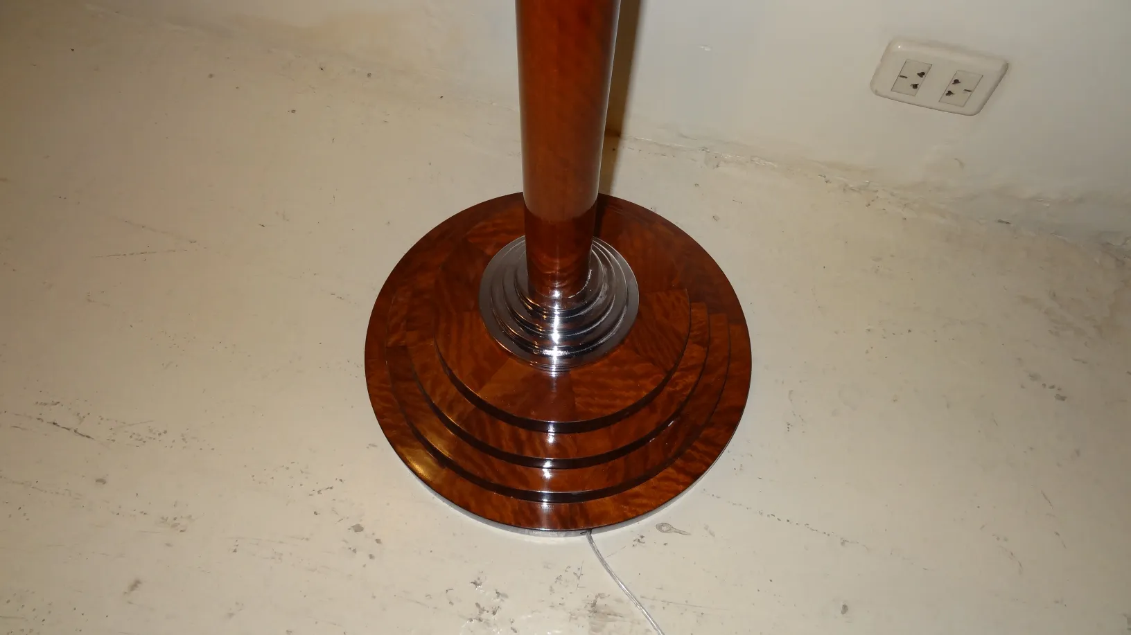 two antique floor lamps with round and elegant base