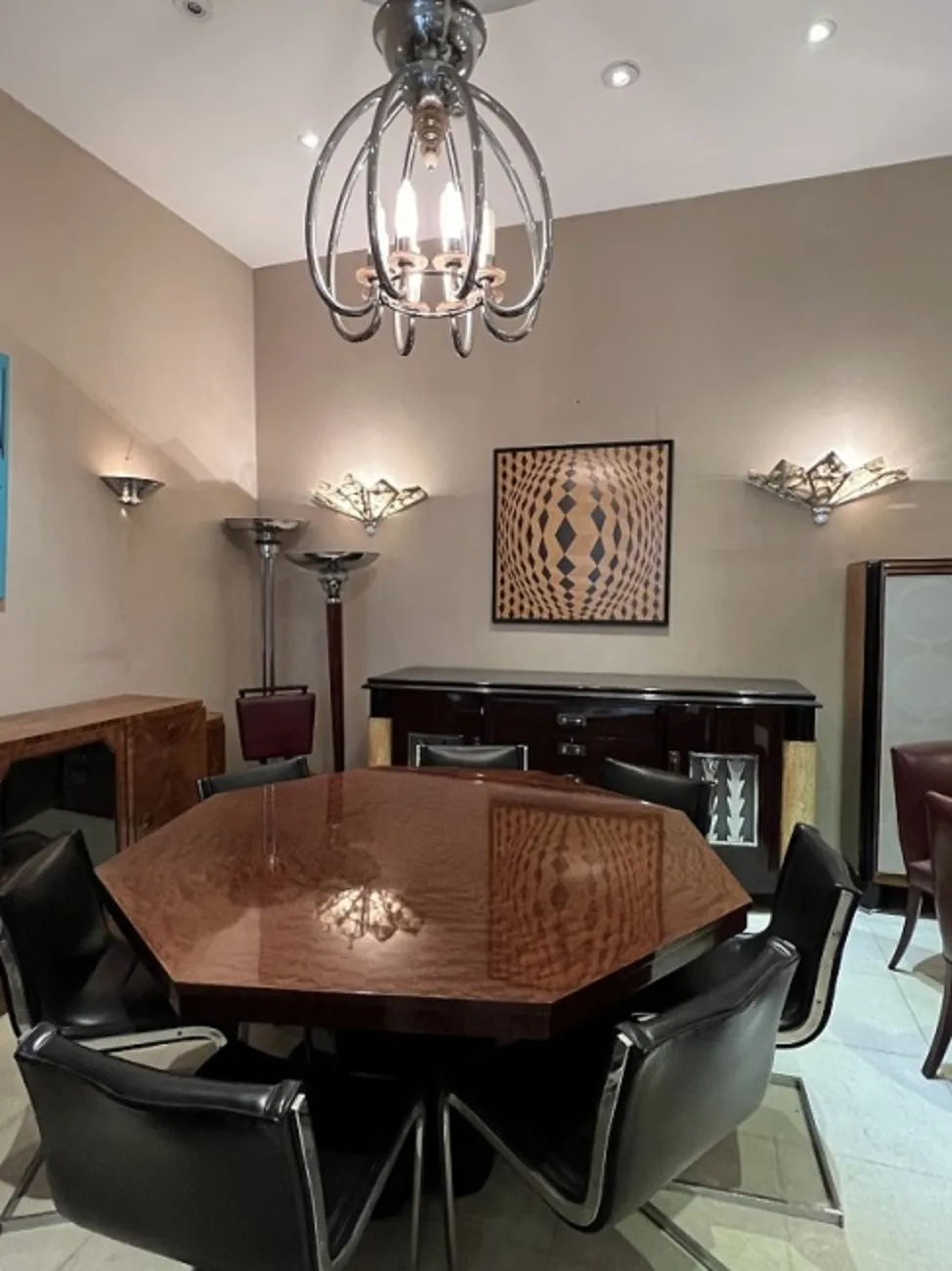 Two antique floor lamps in an elegant setting.