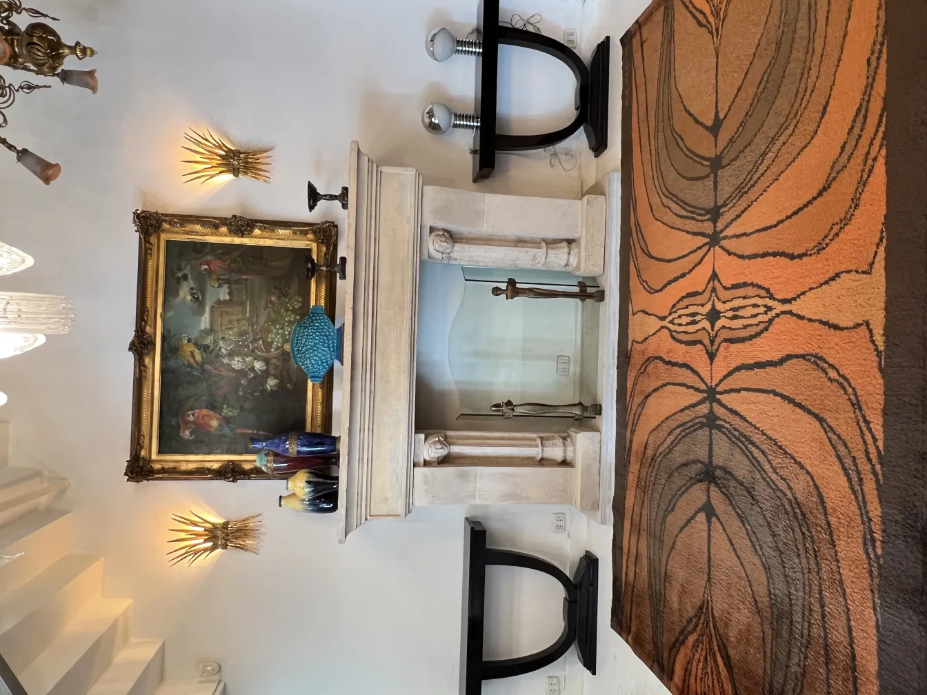 antique carpet with brown and orange patterns, decorating the floor