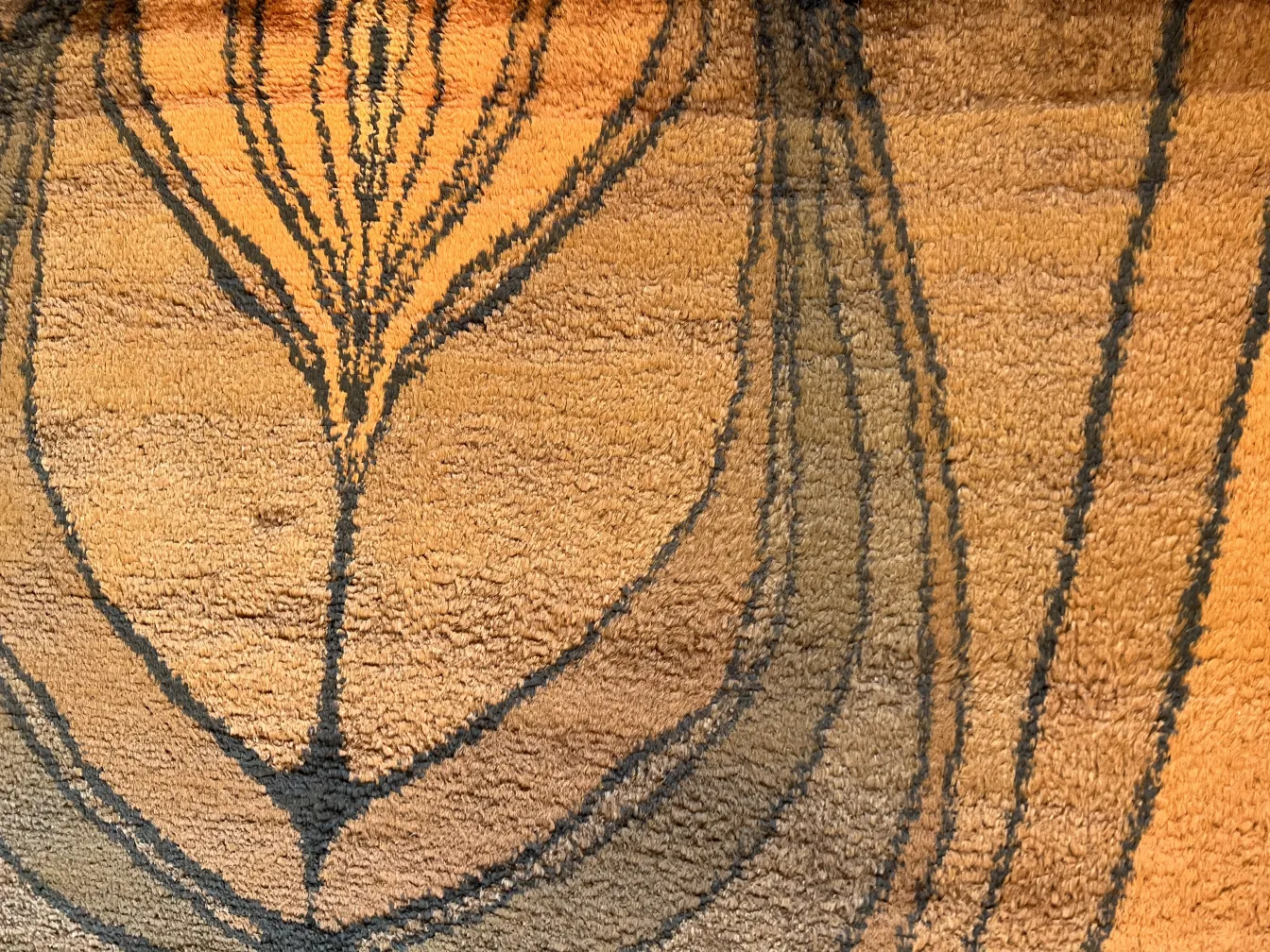 vintage carpet featuring an organic design in warm tones