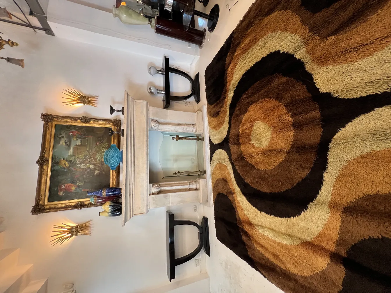 vintage carpet featuring circular design and warm colors, with classic decor