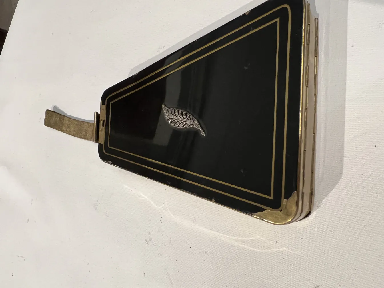 Antique art deco bag with black and gold design