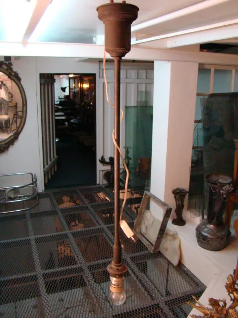 Two antique hanging lamps with classic design in a cozy setting, poultry henningsen style.