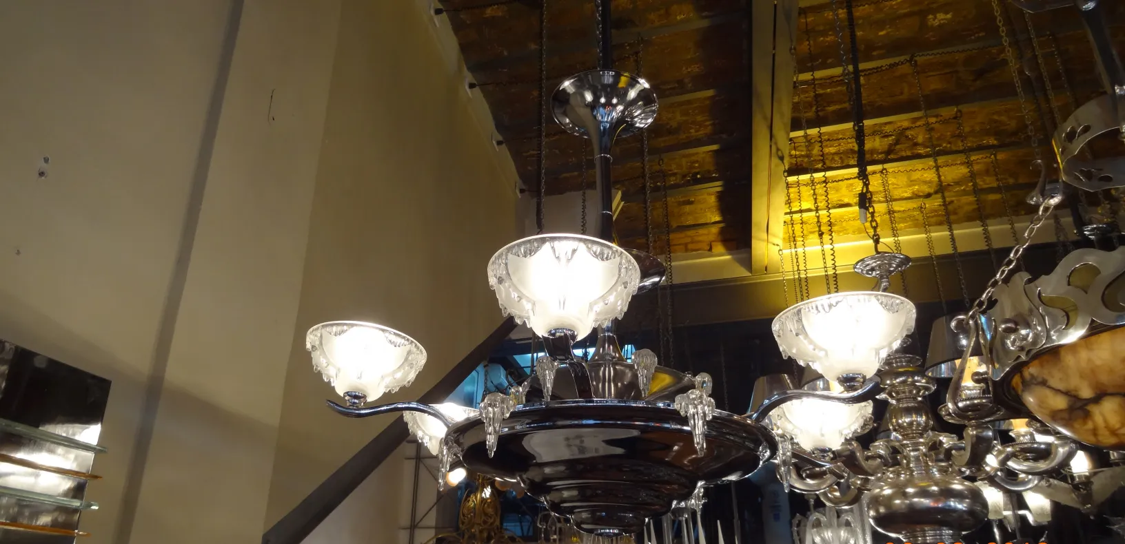 two antique hanging lamps with elegant light in a classic setting