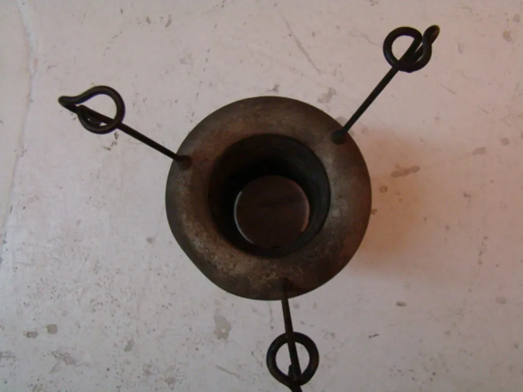 Top view of two vintage hanging lamps with hooks