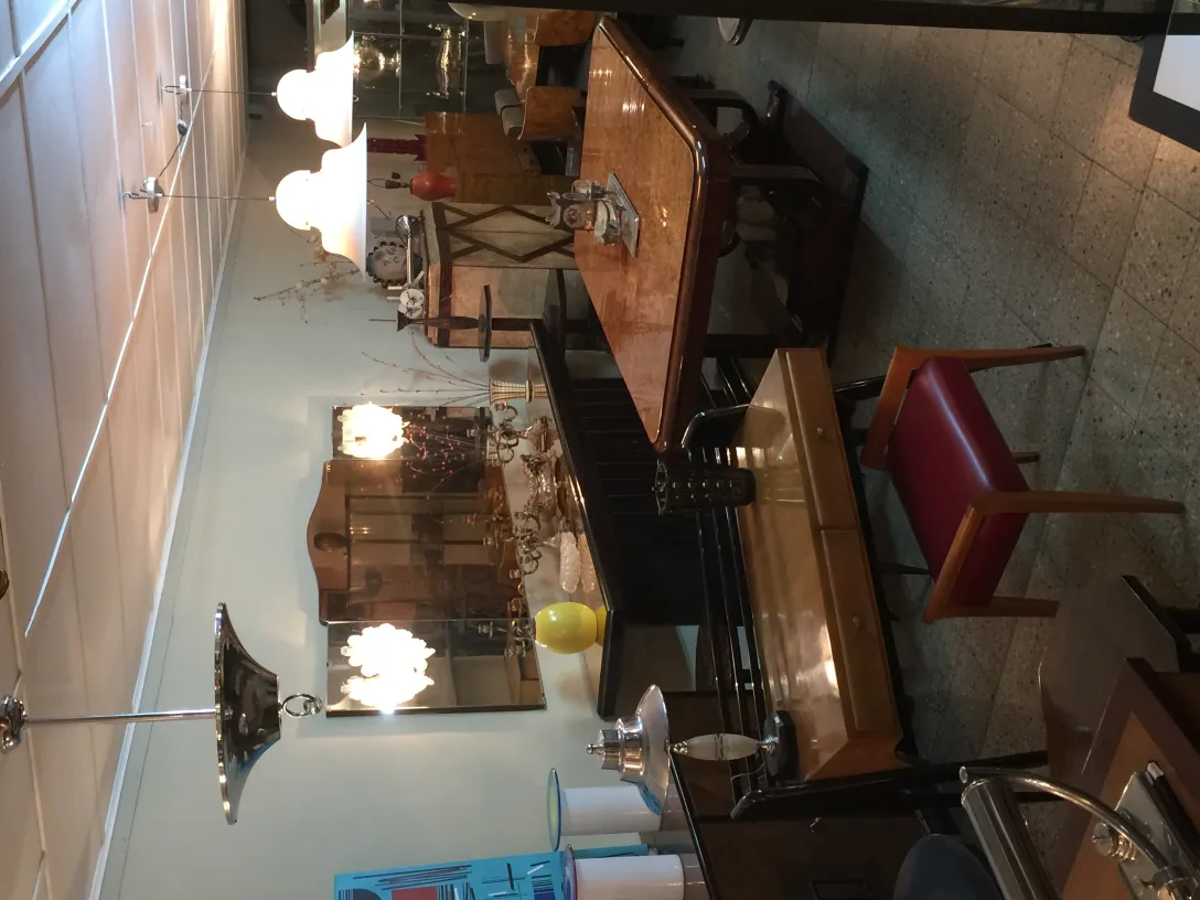 Two antique hanging lamps in a modern setting