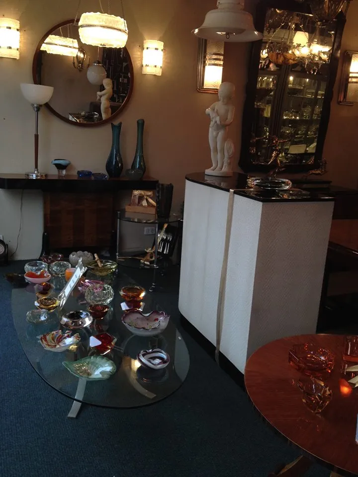 two antique hanging lamps in a furnished setting