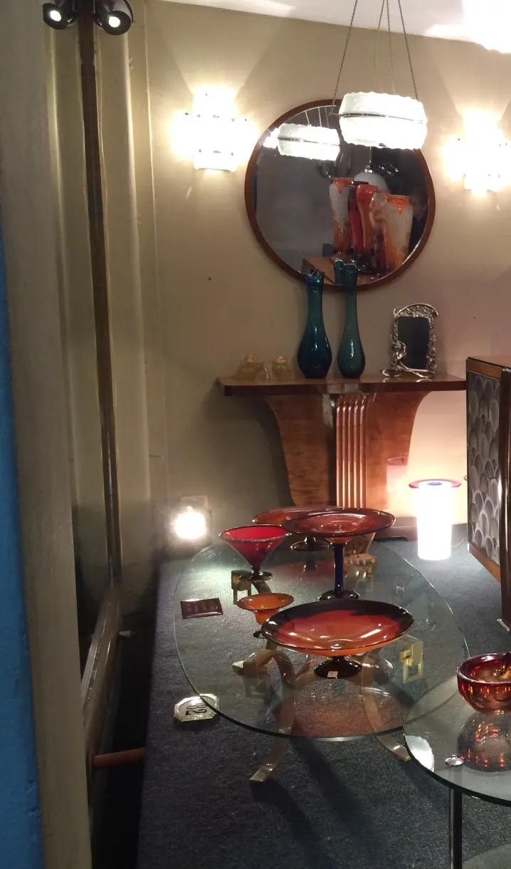 two antique hanging lamps in an elegant setting.